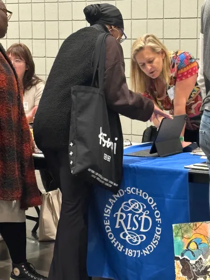Dr. Nell Daniel reviewing portfolios at RISD National Portfolio Day